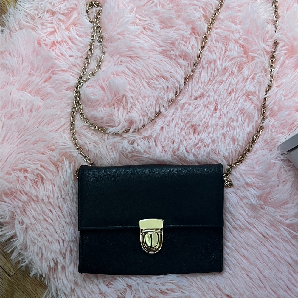 Sophisticated Black Leather Clutch with Gold Chain